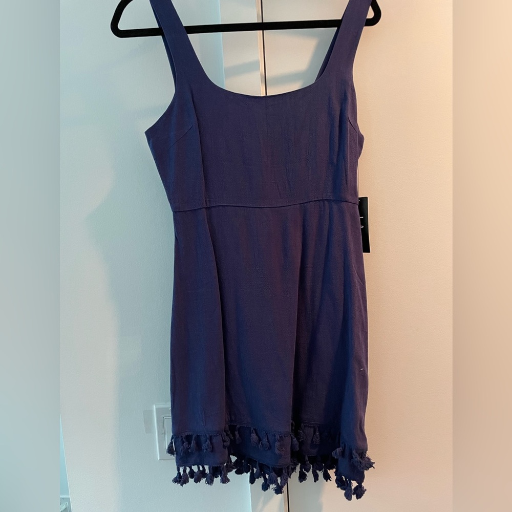 Navy dress with pom poms!